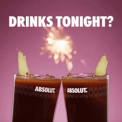 Two Absolut Vodka Glasses With Fireworks GIF