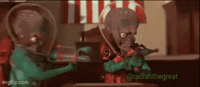 Two Aliens Holding Guns In Front Of American Flag GIF