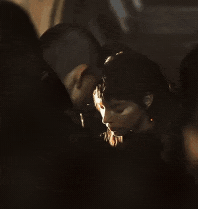 Two Aliens Standing In A Field GIF