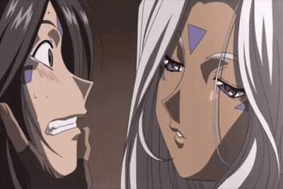 Two Anime Characters Are Looking At Each Other And One Has A Triangle On Her Face GIF