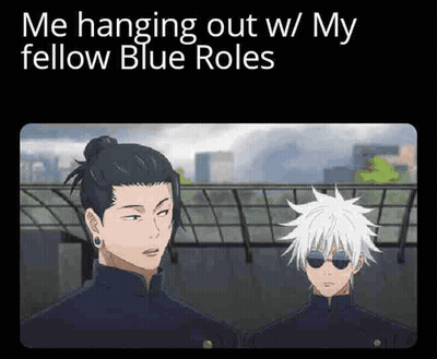 Two Anime Characters Are Standing Next To Each Other In A City . GIF