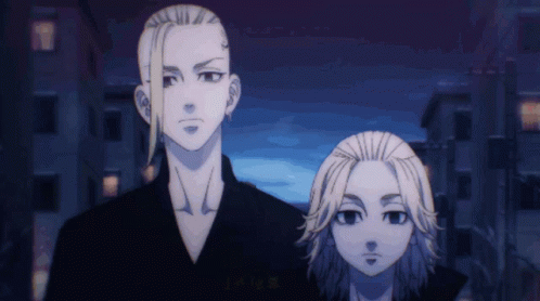 Two Anime Characters Are Standing Next To Each Other In A City GIF