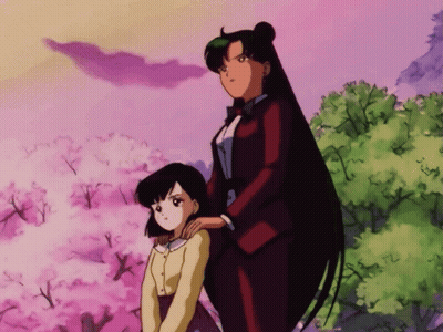 Two Anime Characters Standing In Front Of Trees GIF