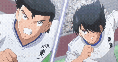 Two Anime Characters With Chinese Writing On Shirts GIF