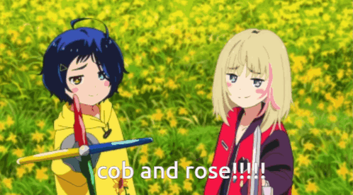Two Anime Girls Are Standing In A Field With The Words Cob And Rose Written Below Them GIF
