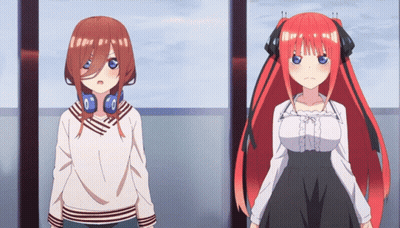 Two Anime Girls Are Standing Next To Each Other And One Has Headphones On GIF