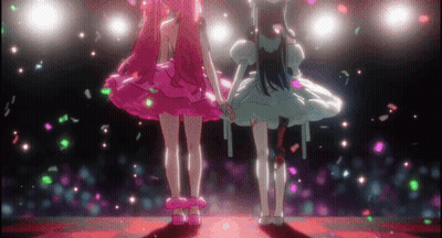Two Anime Girls Holding Hands On Stage GIF