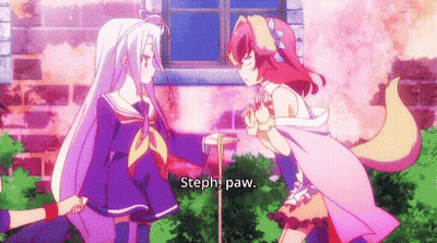 Two Anime Girls In Front Of Brick Building GIF