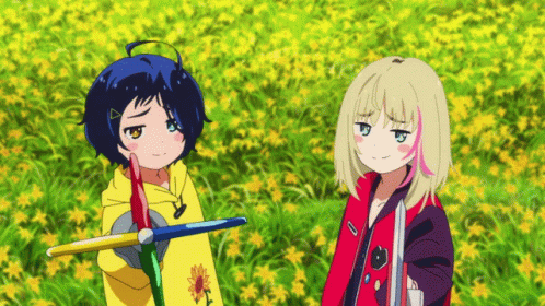 Two Anime Girls Standing In A Field Of Flowers GIF