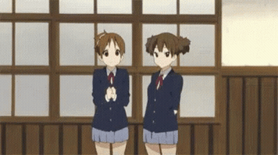 Two Anime Girls Standing In A Room GIF