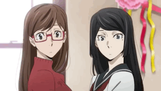 Two Anime Girls Standing In Room Looking At Each Other GIF