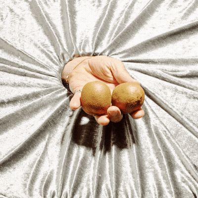 Two Balls In Open Hand GIF