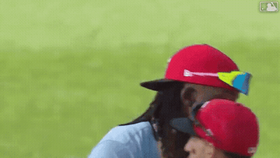 Two Baseball Players Hugging GIF