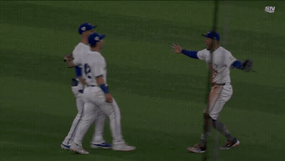 Two Baseball Players Hugging, One With 42 GIF