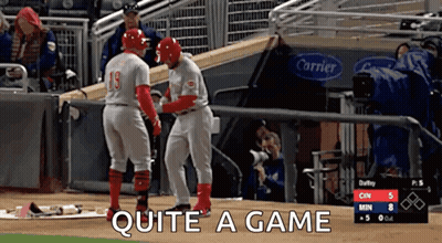 Two Baseball Players On The Field With Quite A Game Written On The Bottom GIF