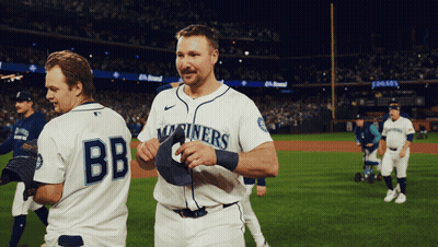 Two Baseball Players One Of Whom Is Wearing A Jersey That Says Bb GIF