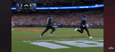 Two Baseball Players Running On Field GIF
