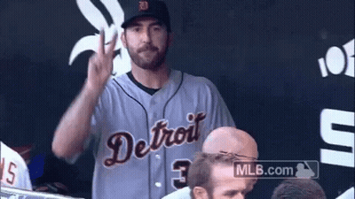 Two Baseball Players Sitting In Front Of Bank Of America Logo GIF
