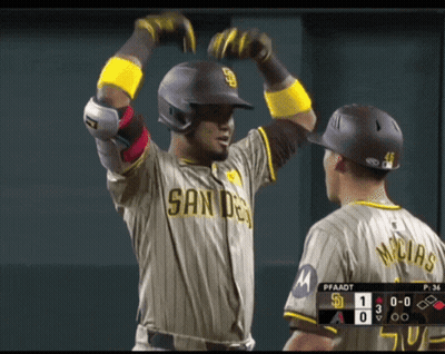 Two Baseball Players Wearing San Diego Uniforms Celebrate GIF