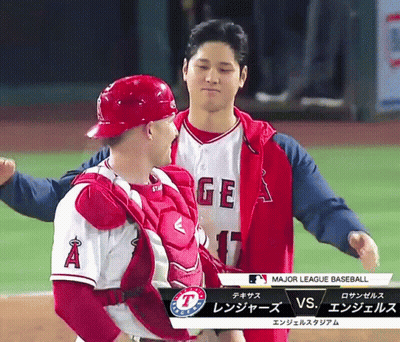 Two Baseball Players With A And GE On Shirts GIF