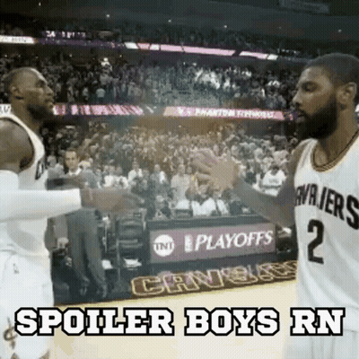 Two Basketball Players Are Shaking Hands On The Court During A Game . GIF