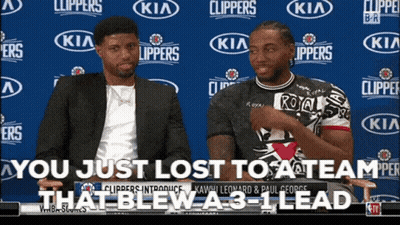 Two Basketball Players Are Sitting At A Table With The Words You Just Lost To A Team That Blew A 3-1 Lead GIF
