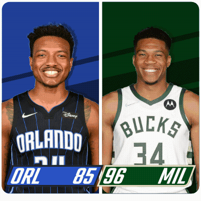Two Basketball Players From The Orlando Magic And The Bucks Are Standing Next To Each Other GIF
