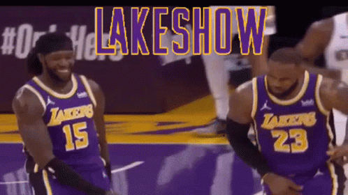 Two Basketball Players In Lakers Jerseys GIF