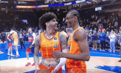 Two Basketball Players On A Court With One Wearing A Number 4 Jersey GIF