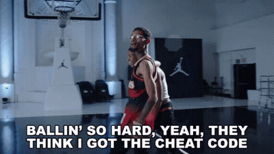 Two Basketball Players On A Court With The Words Ballin ' So Hard Yeah They Think I Got The Cheat Code Below Them GIF