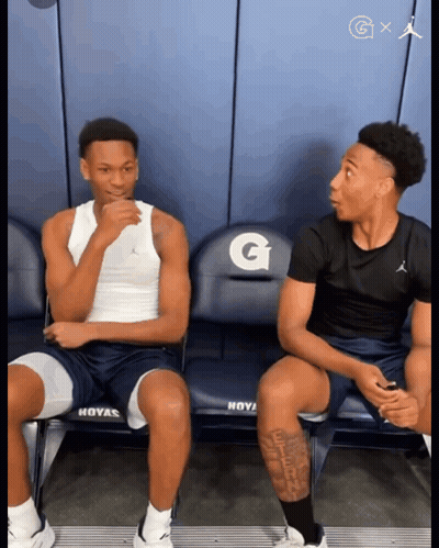 Two Basketball Players On Bench With Gatorade GIF
