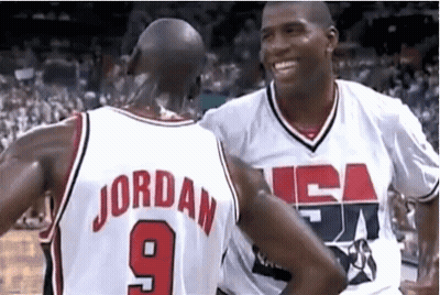 Two Basketball Players One Of Whom Has The Number 9 On His Back GIF