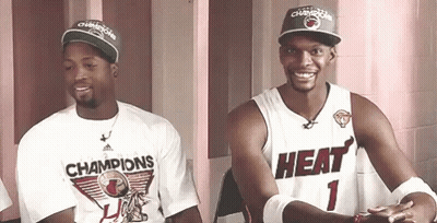 Two Basketball Players One Wearing A Heat Jersey GIF