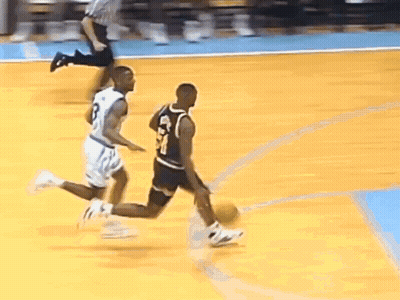 Two Basketball Players Playing On Court GIF
