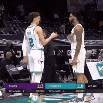 Two Basketball Players Talking GIF