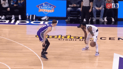 Two Basketball Players With Blue Diamond Almonds Ad GIF