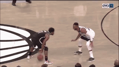 Two Basketball Players With Fox Logo GIF