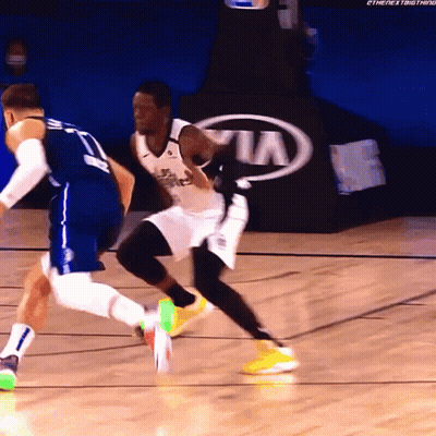 Two Basketball Players With Kia Advertisement GIF