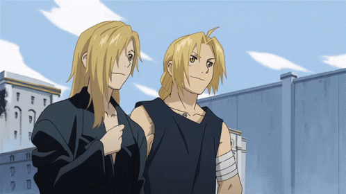 Two Blonde Anime Characters Standing Next To Each Other GIF