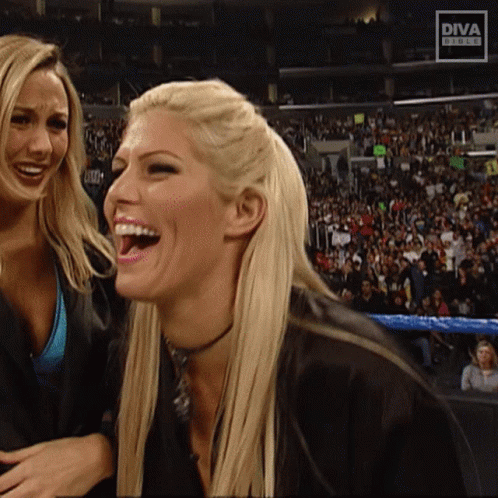 Two Blonde Women Are Laughing In Front Of A Diva Studios Logo GIF
