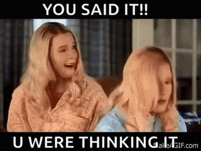 Two Blonde Women Are Sitting Next To Each Other On A Couch And Talking . GIF