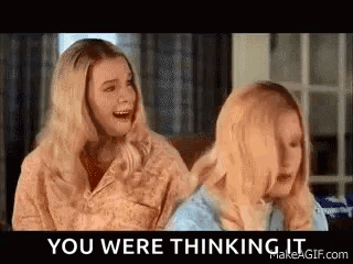 Two Blonde Women Are Sitting Next To Each Other On A Couch And Talking . GIF