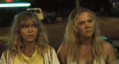 Two Blonde Women Looking At Something GIF