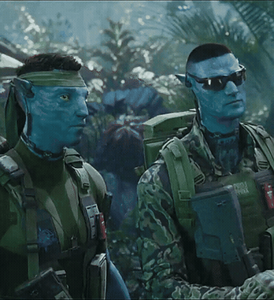 Two Blue-Faced Soldiers One With Army Vest GIF