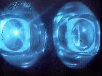 Two Blue Spheres With Letter O GIF