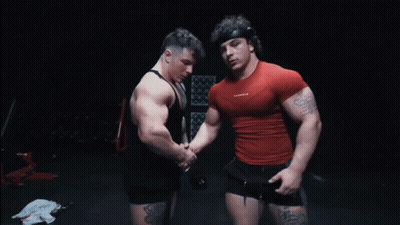 Two Bodybuilders Shaking Hands Red Shirt Xtreme GIF