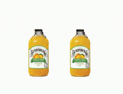 Two Bottles Of Bundaberg Tropical Mango Sitting Next To Each Other On A White Background GIF