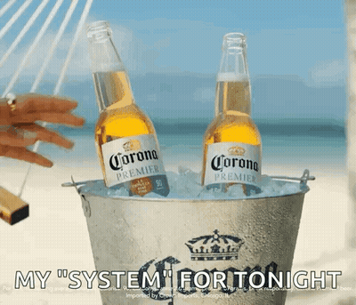 Two Bottles Of Corona Beer Are In A Bucket Of Ice GIF