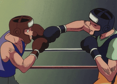 Two Boxers Are Fighting In A Ring With One Wearing A Helmet With The Letter O On It GIF