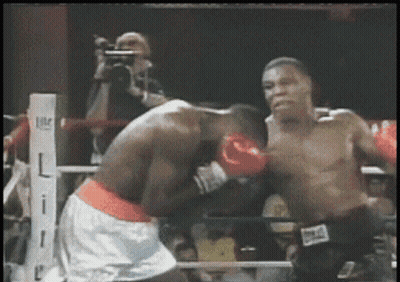 Two Boxers Fighting In Ring GIF